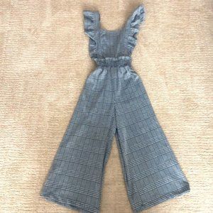 Anthropologie plaid jumpsuit with ruffle detail